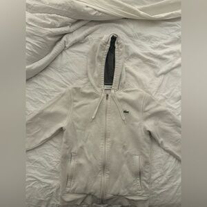 Lacoste size small women’s hoodie. Discoloration on the wrists,